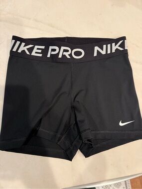 Nike Black Performance Compression Shorts with White Swoosh